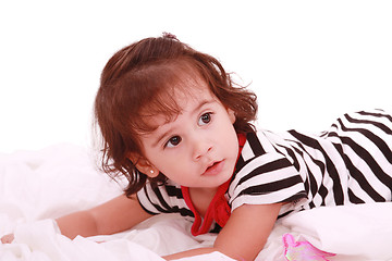 Image showing baby girl lying on the bed with swimsuit with space for advertis