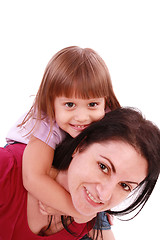 Image showing Mother and daughter smiling into the camera lens