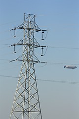 Image showing Blimp from between power lines