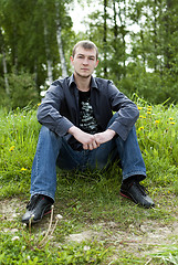 Image showing man sitting in the woods