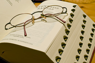 Image showing Glasses and book