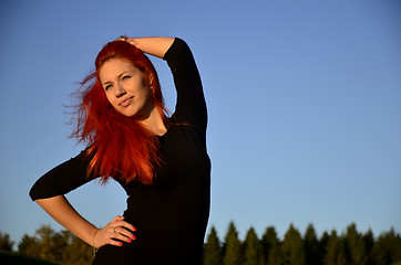 Image showing Redhead girl posing