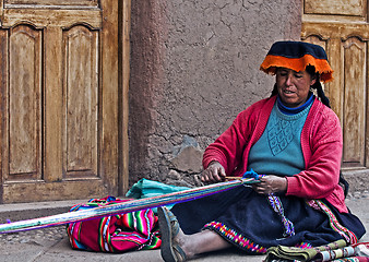 Image showing Peruvian woman weaving