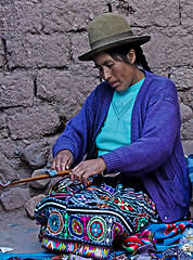 Image showing Peruvian woman weaving