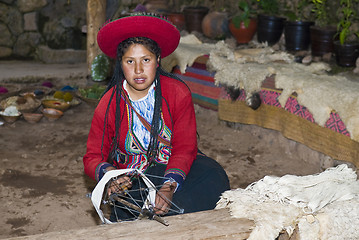 Image showing Peruvian woman weaving