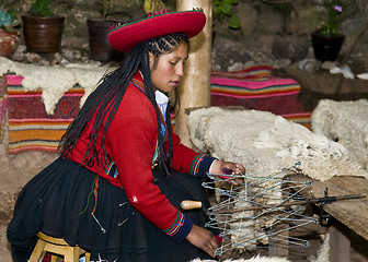 Image showing Peruvian woman weaving