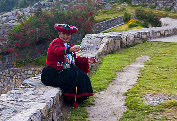 Image showing Peruvian woman weaving