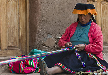 Image showing Peruvian woman weaving