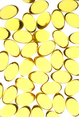 Image showing Close up of yellow gel capsules.