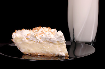 Image showing Pineapple coconut cream pie with toasted coconut and milk