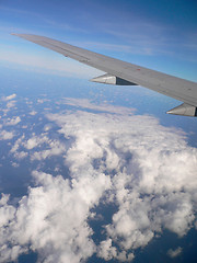 Image showing Aeroplane wing over clouds.
