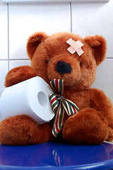 Image showing toy teddy bear on wc toilet