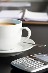 Image showing cup of coffee in the office