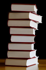 Image showing tall pile of books