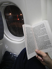 Image showing Reading a book on the plane