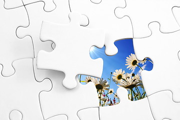 Image showing puzzle and flower