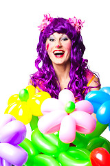 Image showing female clown with colorful balloon flowers