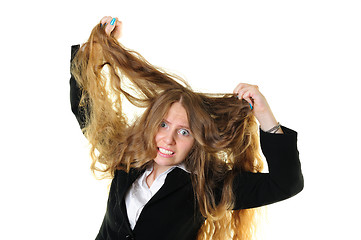 Image showing Businesswoman tearing her hair