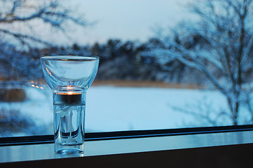Image showing Candle on a window-sill 