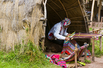 Image showing Peruvian man weaving