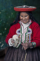 Image showing Peruvian woman weaving