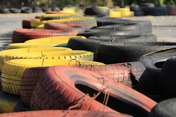 Image showing Red and yellow tyres