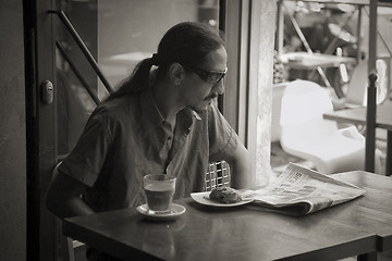 Image showing Young man in cafe