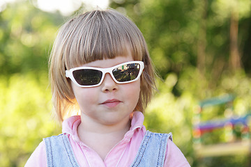 Image showing Little girl with sunglasses