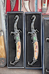 Image showing Arabian souvenirs - Oriental knife with ornament