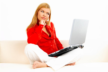 Image showing Women with laptop on couch