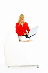 Image showing Women with laptop on couch