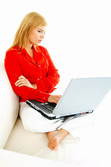 Image showing Women with laptop on couch