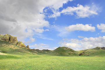 Image showing landscape in early spring in the field, cloudy sky  mountain