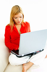 Image showing Women with laptop on couch