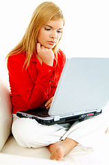 Image showing Women with laptop on couch