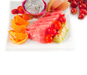 Image showing mixed plate of fresh sliced fruits