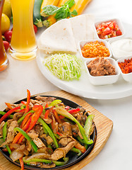 Image showing original fajita sizzling hot  on iron plate