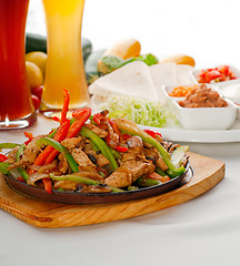 Image showing original fajita sizzling hot  on iron plate