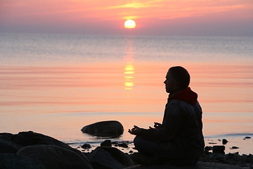 Image showing silhouette of sitting man