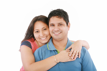 Image showing Portrait of a beautiful young happy smiling couple - isolated 
