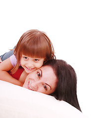 Image showing Young Mother and daugther embracing on bed 