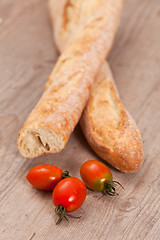 Image showing Baguette and tomatoes