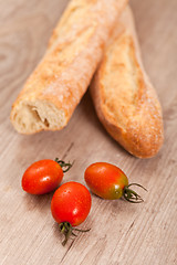 Image showing Baguette and tomatoes