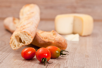 Image showing Baguette and tomatoes