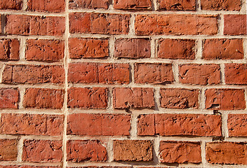 Image showing Old brick wall built of clay bricks.