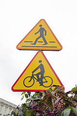 Image showing Road signs, pedestrian walkway and bicycle path.