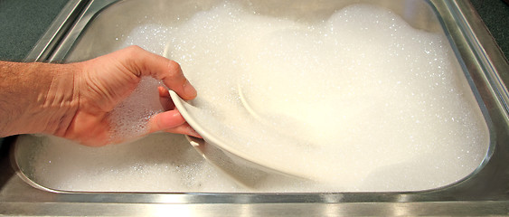 Image showing cleaning dishes