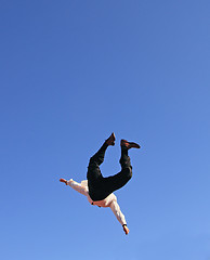 Image showing flying businessman