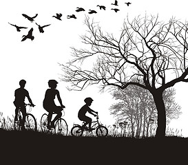 Image showing Family cycling in the countryside