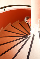 Image showing Portrait of a beautiful young girl on  staircase